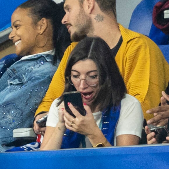 M. Pokora, sa femme Christina Milian assistent au match de la 5e et avant-dernière journée de Ligue des nations entre la France et l'Autriche (2-0) au Stade de France à Saint-Denis le 22 septembre 2022.