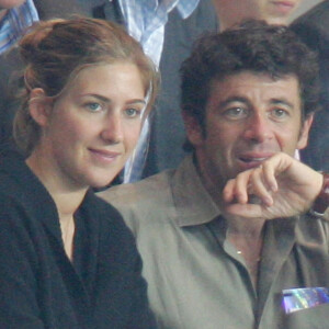 Patrick Bruel et Amanda Sthers lors d'un match du PSG contre l'OM au parc des princes en 2006
