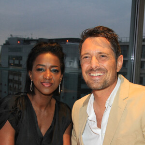 Exclusif - Hapsatou Sy et son mari Vincent Cerruti - Le Grand Dîner du 14 juillet, sur le rooftop de l'hôtel Pullman Tour Eiffel à Paris, France, le 14 juillet 2021. © Philippe Baldini/Bestimage 