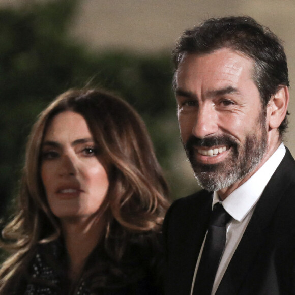 L'ancien joueur de football français Robert Pires et sa femme Jessica - Dîner au Palais de l'Elysée en l'honneur des 50 ans du Variétés Club de France, à Paris, le 14 octobre 2021. © Stéphane Lemouton / Bestimage