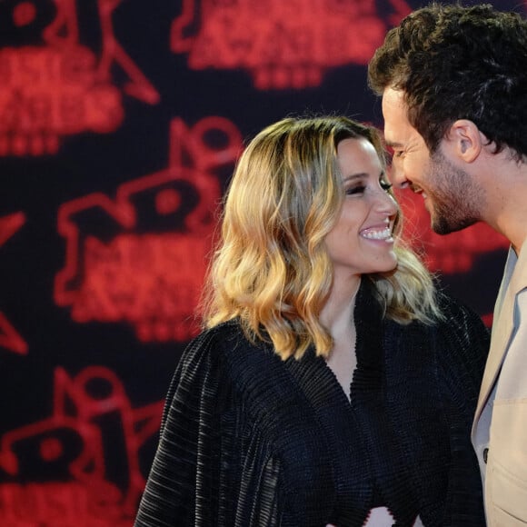 Amir et sa femme Lital lors de la 23ème édition des NRJ Music Awards 2021 au Palais des Festivals de Cannes, le 20 novembre 2021. 