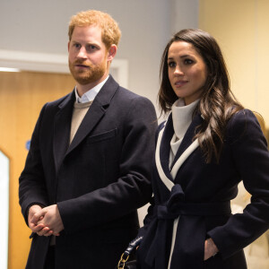 Le prince Harry et sa fiancée Meghan Markle assistent à une séance de formation des apprentis coaches au Nechells Wellbeing Centre à Birmingham le 8 mars 2018. 