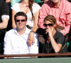 Herve Mathoux et sa femme Maryline Olivie - Jour 10 - People aux Internationaux de France de tennis de Roland Garros lors du match de Jo-Wilfried Tsonga contre Roger Federer le 4 juin 2013.