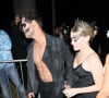 Taylor Lautner et Taylor Dome arrivent à la Fête d'Halloween Casamigos à Beverly Hills, États Unis le 28 Octobre 2022.