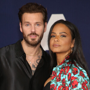 Matt Pokora et sa femme Christina Milian au photocall lors de la première du film "Ambulance" à Los Angeles le 4 avril 2022. 