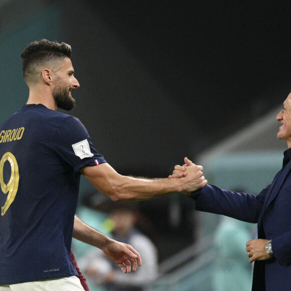 joie de GIROUD Olivier (FRA) avec Didier Deschamps entraineur / Selectionneur France - Match "France - Australie (4-1)" lors de la Coupe du Monde 2022 au Qatar, le 22 novembre 2022. 