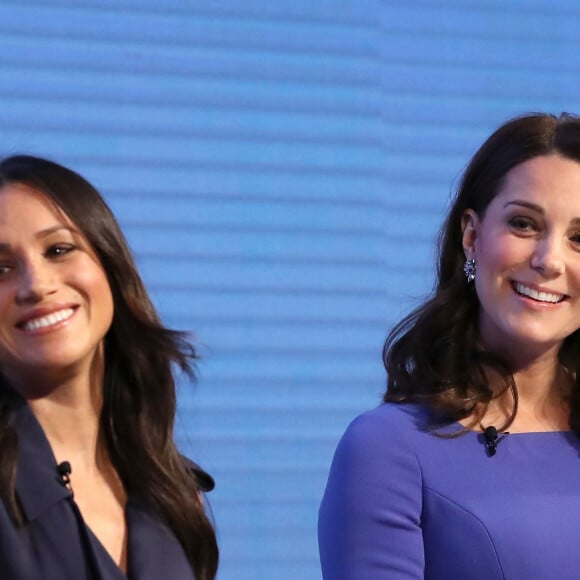 Le prince William, duc de Cambridge, Catherine (Kate) Middleton, duchesse de Cambridge (enceinte), le prince Harry et sa fiancée Meghan Markle assistent au premier forum annuel de la Royal Foundation qui se tient à Aviva le 28 février 2018 à Londres, en Angleterre.