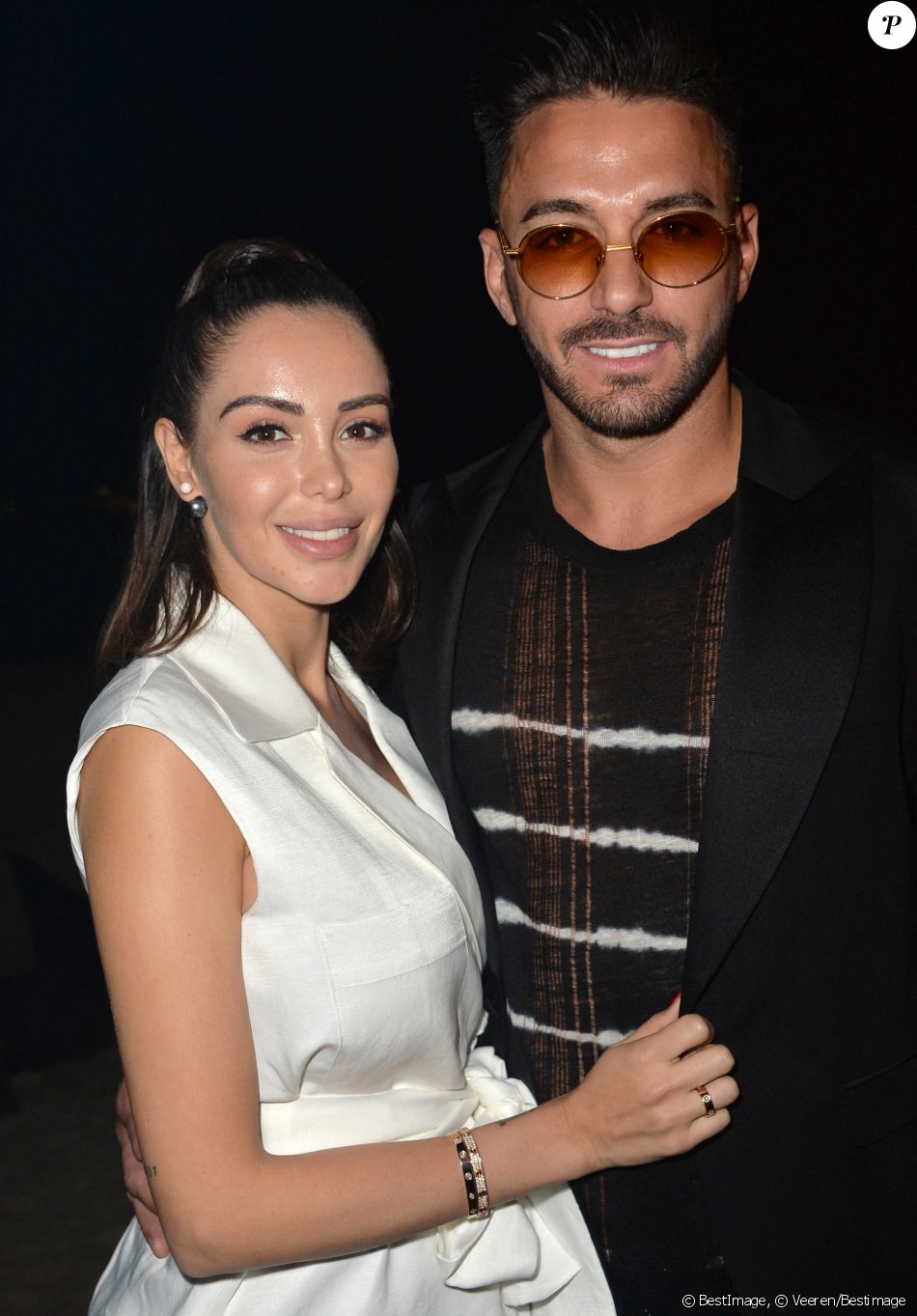 Nabilla Benattia (enceinte) et son mari Thomas Vergara au photocall de l&#039;after party &quot;Magnum x Rita Ora&quot; sur la plage privée Magnum lors du 72ème Festival International du Film de Cannes, France,le 16 mai 2019. © Veeren/Bestimage   