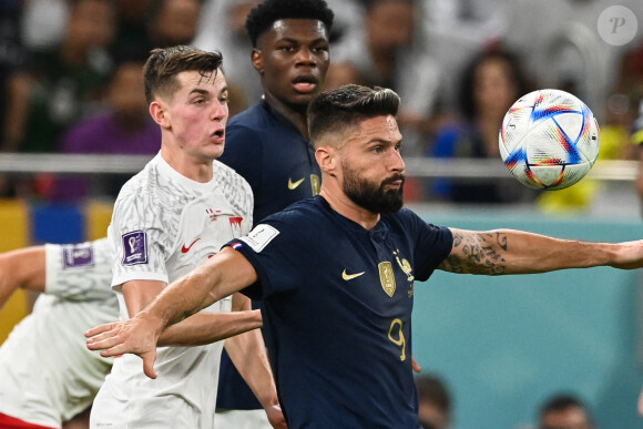 Jakub Kamiński, Olivier Giroud - Match de football de la Coupe du Monde FIFA Qatar 2022 : la France bat la Pologne 3 à 1 en 8ème de finale au Al Thumama Stadium à Doha le 4 décembre 2022. © Philippe Perusseau / Bestimage