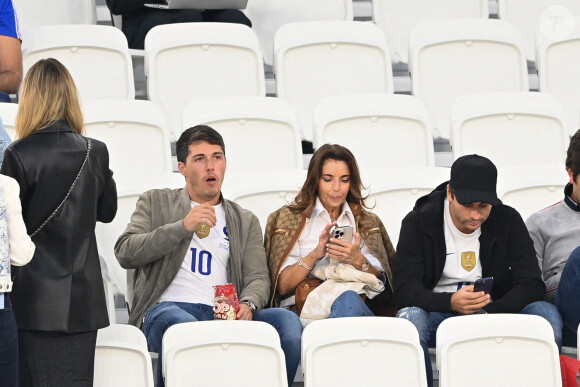 Claude Deschamps, la femme de D.Deschamps et son fils Dylan - Femmes et compagnes des joueurs lors du match "France - Pologne" (3-1) lors de la Coupe du Monde 2022 au Qatar (FIFA World Cup Qatar 2022) le 4 décembre 2022. © Philippe Perusseau / Bestimage