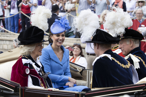 Le prince William, duc de Cambridge, et Catherine (Kate) Middleton, duchesse de Cambridge, le prince Charles, prince de Galles, et Camilla Parker Bowles, duchesse de Cornouailles, lors de la cérémonie de l'ordre de la Jarretière à la chapelle Saint-Georges du château de Windsor. Cette année pour la première fois Camilla Parker Bowles, duchesse de Cornouailles, a été investie comme nouveau chevalier de l'ordre de la Jarretière par la reine et a pu participer à la procession au côté du prince Charles. Londres, la 13 juin 2022. 
