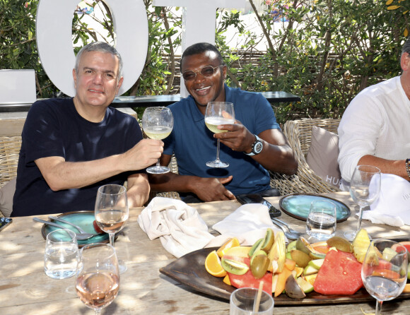 Exclusif - Ricardo Guadalupe, directeur général de Hublot et Marcel Desailly - Hublot fête l'arrivée de la nouvelle Big Bang Unico à la boutique de Saint-Tropez au restaurant Verde Beach à Ramatuelle, Côte d'Azur, France, le 12 juillet 2022. © Luc Boutria/Nice Matin/Bestimage