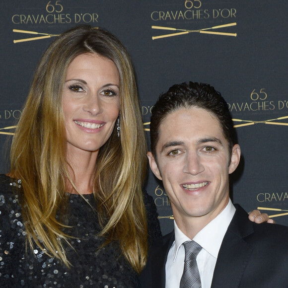 Sophie Thalmann, son mari Christophe Soumillon - 65ème édition des Cravaches d'Or au Théâtre des Champs-Elysées à Paris le 14 mars 2014.