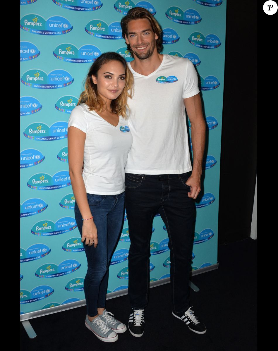 Camille Lacourt et sa femme Valérie Bègue sont les parrain et marraine du 10ème anniversaire du partenariat entre Pampers et l'Unicef pour le vaccin des enfants contre le tétanos. Paris, le 13 novembre 2015