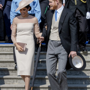 Le prince Harry, duc de Sussex, et Meghan Markle, duchesse de Sussex, lors de la garden party pour les 70 ans du prince Charles au palais de Buckingham à Londres. Le 22 mai 2018 