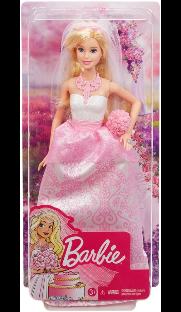 Barbie va vivre le plus beau jour de sa vie dans une robe resplendissante rose et blanche avec cette poupée Barbie mariée
