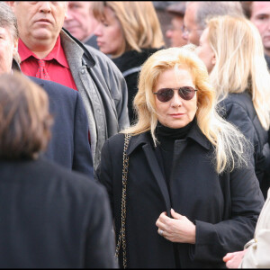 Sylvie Vartan et Tony Scotti - Obsèques du chanteur Carlos en l'église Saint-Germain-des-Prés à Paris