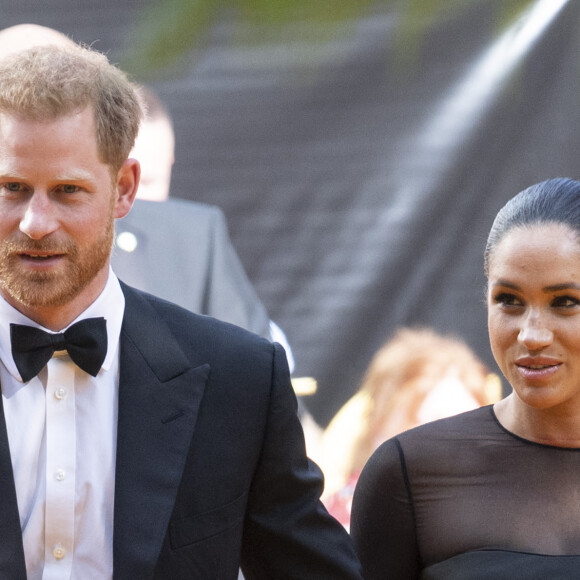 Le prince Harry, duc de Sussex, et Meghan Markle, duchesse de Sussex, à la première du film "Le Roi Lion" au cinéma Odeon Luxe Leicester Square à Londres, le 14 juillet 2019. 