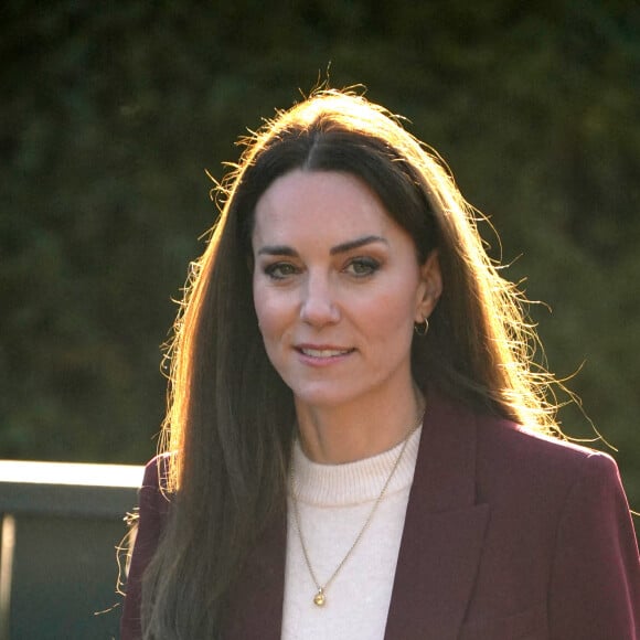 Catherine (Kate) Middleton, princesse de Galles, arrive à une réception pour l'équipe de la Ligue anglaise de rugby en fauteuil roulant en reconnaissance de son succès lors de la récente coupe du monde de la Ligue de rugby, dans la salle du jardin, au Hampton court Palace, à Londres, Royaume Uni, le 19 janvier 2023. 