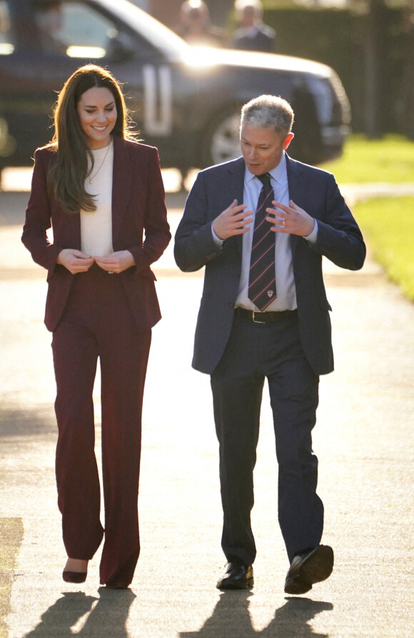 Catherine (Kate) Middleton, princesse de Galles, arrive à une réception pour l'équipe de la Ligue anglaise de rugby en fauteuil roulant en reconnaissance de son succès lors de la récente coupe du monde de la Ligue de rugby, dans la salle du jardin, au Hampton court Palace, à Londres, Royaume Uni, le 19 janvier 2023. 