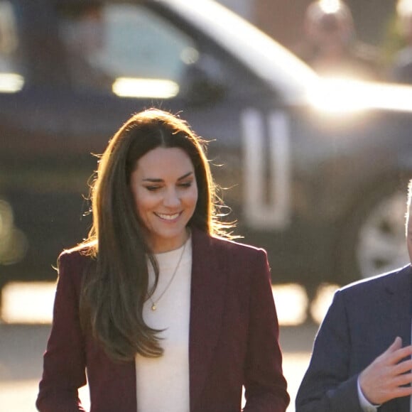 Catherine (Kate) Middleton, princesse de Galles, arrive à une réception pour l'équipe de la Ligue anglaise de rugby en fauteuil roulant en reconnaissance de son succès lors de la récente coupe du monde de la Ligue de rugby, dans la salle du jardin, au Hampton court Palace, à Londres, Royaume Uni, le 19 janvier 2023. 