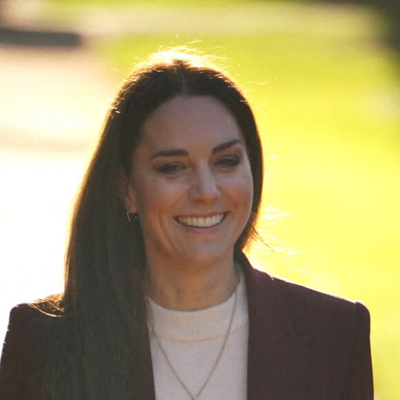 Catherine (Kate) Middleton, princesse de Galles, arrive à une réception pour l'équipe de la Ligue anglaise de rugby en fauteuil roulant en reconnaissance de son succès lors de la récente coupe du monde de la Ligue de rugby, dans la salle du jardin, au Hampton court Palace, à Londres, Royaume Uni, le 19 janvier 2023. 