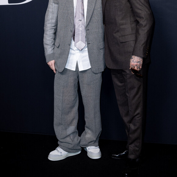 Cruz Beckham et son père David Beckham - Photocall du défilé Dior lors de la Fashion Week Homme automne-hiver 2023/24 de Paris, France, le 20 janvier 2023. © Olivier Borde/Bestimage 