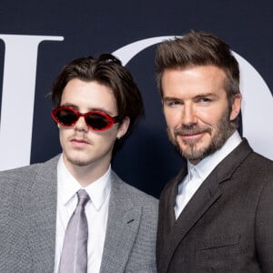 Cruz Beckham et son père David Beckham - Photocall du défilé Dior lors de la Fashion Week Homme automne-hiver 2023/24 de Paris, France, le 20 janvier 2023. © Olivier Borde/Bestimage 