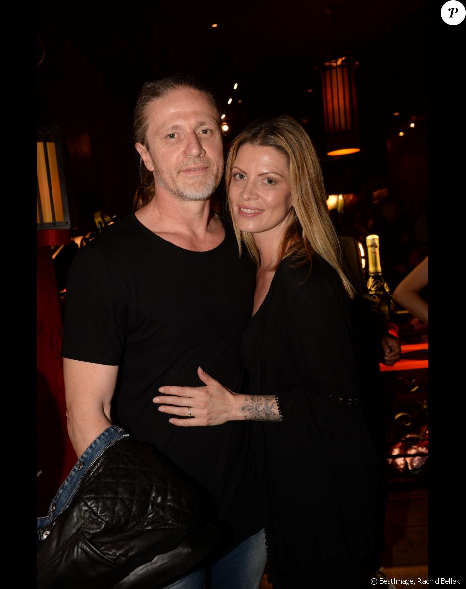 Emmanuel Petit et sa femme Maria - A l'occasion des 20 ans de la victoire de l'équipe de France, les bleus 98 se sont rendus à un dîner organisé au Buddha Bar avec tous les joueurs et leur famille le 11 juin 2018. © Rachid Bellak/Bestimage