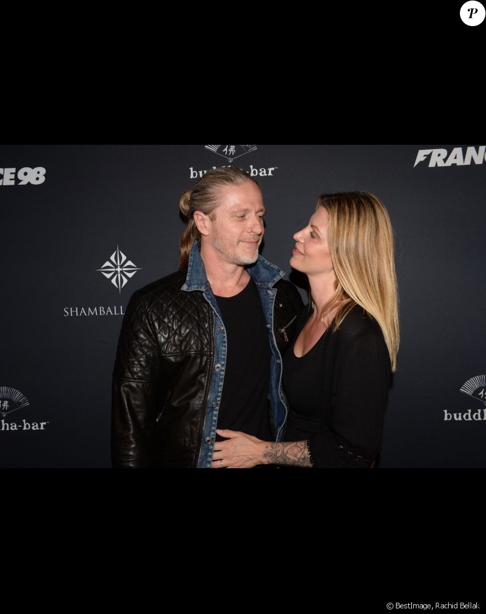 Emmanuel Petit et sa femme Maria - A l'occasion des 20 ans de la victoire de l'équipe de France, les bleus 98 se sont rendus à un dîner organisé au Buddha Bar avec tous les joueurs et leur famille le 11 juin 2018. © Rachid Bellak/Bestimage