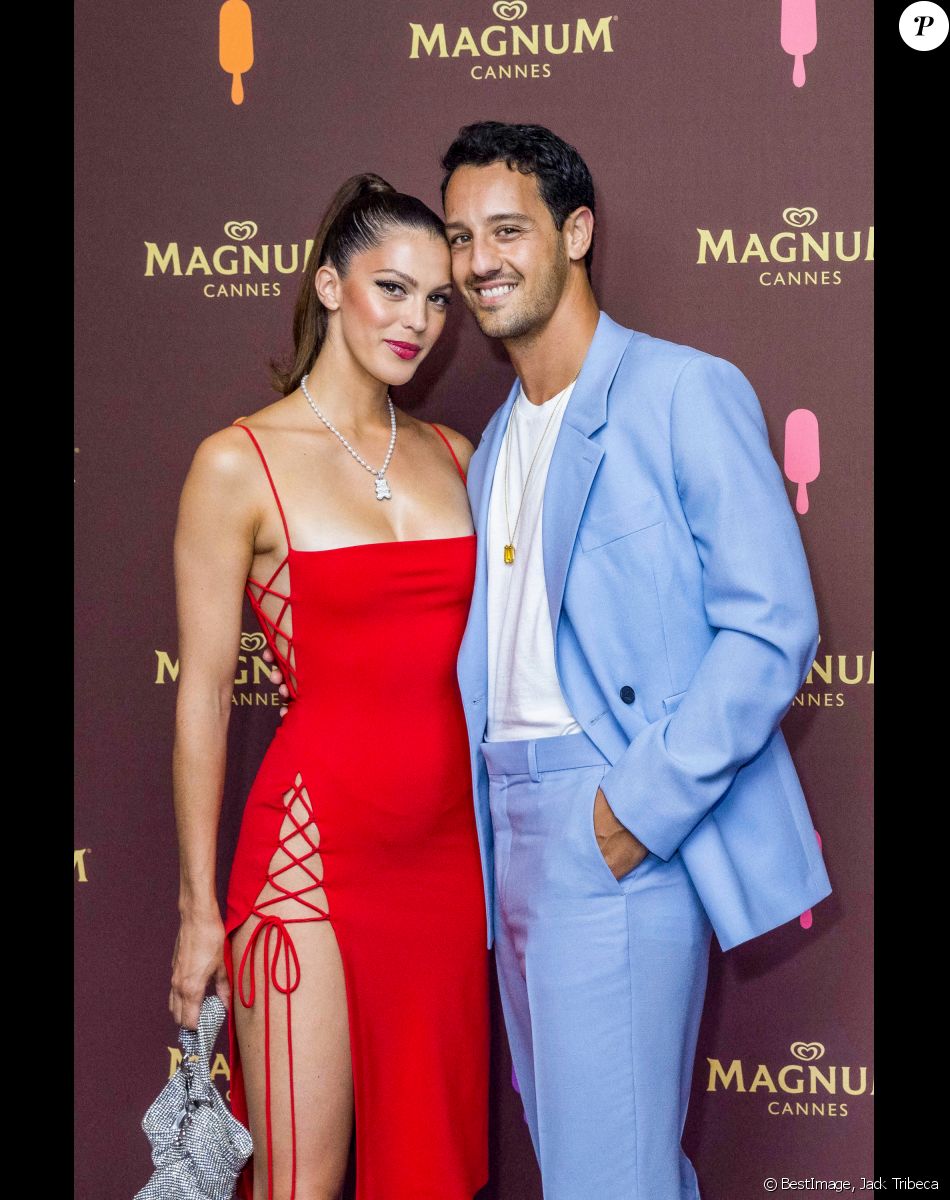 Iris Mittenaere (Miss France 2016) et son compagnon Diego El Glaoui au photocall de la soirée "Magnum" lors du 75ème Festival International du Film de Cannes le 19 mai 2022.© Jack Tribeca / Bestimage