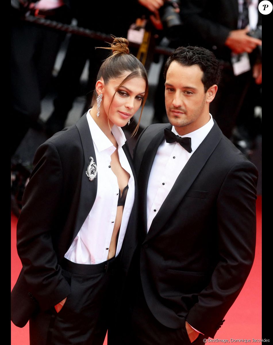 Iris Mittenaere et son compagnon Diego El Glaoui à la montée des marches du film " Top Gun : Maverick " lors du 75ème Festival International du Film de Cannes. Le 18 mai 2022 © Dominique Jacovides / Bestimage