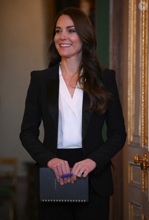 Catherine (Kate) Middleton, princesse de Galles, lors d'une réunion avec des experts du milieu universitaire, des sciences et du secteur de la petite enfance au château de Windsor. 