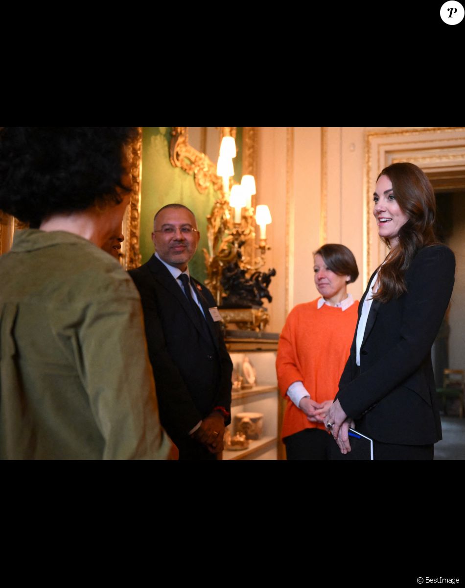 Catherine (Kate) Middleton, princesse de Galles, lors d'une réunion avec des experts du milieu universitaire, des sciences et du secteur de la petite enfance au château de Windsor, le 25 janvier 2023.