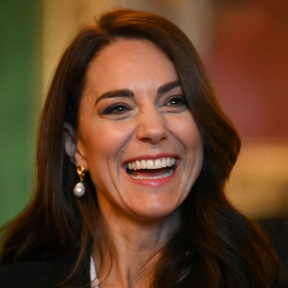 Catherine (Kate) Middleton, princesse de Galles, lors d'une réunion avec des experts du milieu universitaire, des sciences et du secteur de la petite enfance au château de Windsor, le 25 janvier 2023. 