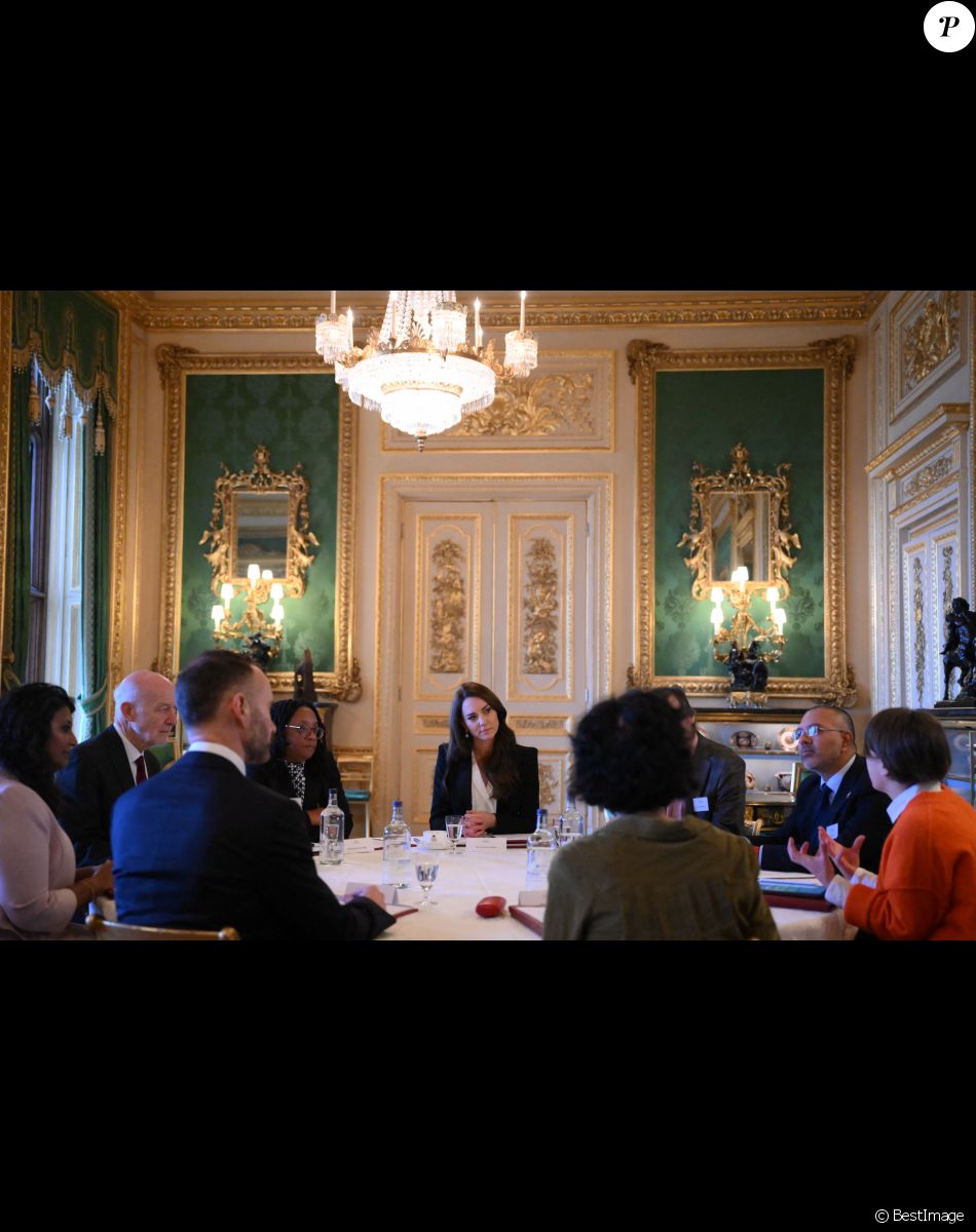 Catherine (Kate) Middleton, princesse de Galles, lors d'une réunion avec des experts du milieu universitaire, des sciences et du secteur de la petite enfance au château de Windsor, le 25 janvier 2023.