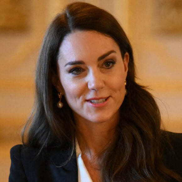 Catherine (Kate) Middleton, princesse de Galles, lors d'une réunion avec des experts du milieu universitaire, des sciences et du secteur de la petite enfance au château de Windsor, le 25 janvier 2023. 