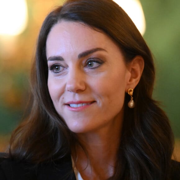 Catherine (Kate) Middleton, princesse de Galles, lors d'une réunion avec des experts du milieu universitaire, des sciences et du secteur de la petite enfance au château de Windsor, le 25 janvier 2023. 