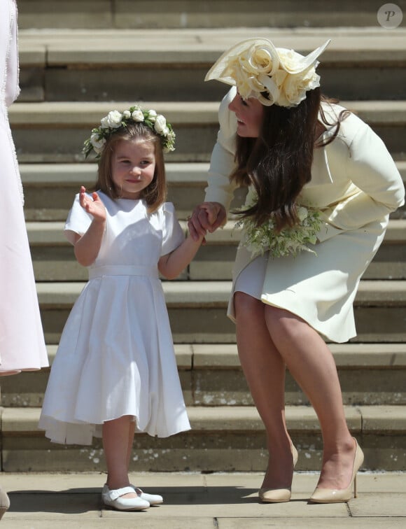 Catherine (Kate) Middleton, duchesse de Cambridge et La princesse Charlotte de Cambridge - Les invités à la sortie de la chapelle St. George au château de Windsor, Royaume Uni, le 19 mai 2018. 