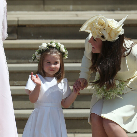 Catherine (Kate) Middleton, duchesse de Cambridge et La princesse Charlotte de Cambridge - Les invités à la sortie de la chapelle St. George au château de Windsor, Royaume Uni, le 19 mai 2018. 