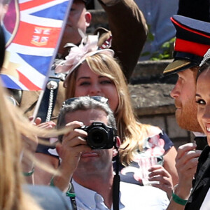 Le prince Harry, duc de Sussex, et Meghan Markle, duchesse de Sussex, en calèche au château de Windsor après la cérémonie de leur mariage au château de Windsor, Royaume Uni, le 19 mai 2018. 