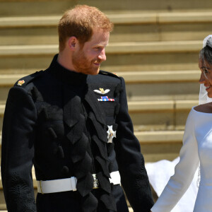 Le prince Harry, duc de Sussex, et Meghan Markle, duchesse de Sussex, à la sortie de chapelle St. George au château de Windsor - Sortie après la cérémonie de mariage du prince Harry et de Meghan Markle en la chapelle Saint-George au château de Windsor, Royaume Uni, le 19 mai 2018. 