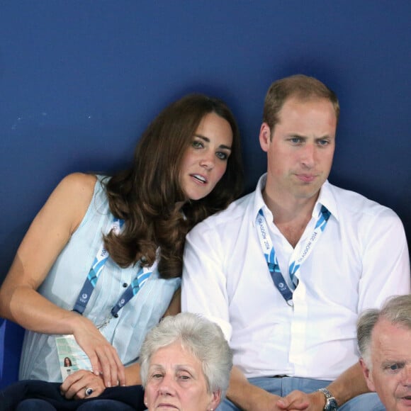 Le prince William, Catherine Kate Middleton, la duchesse de Cambridge et le prince Harry assistent à l'épreuve de natation aux XXèmes Jeux du Commonwealth à Glasgow, le 28 juillet 2014. 