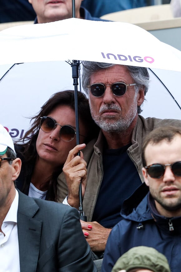 Marc Simoncini et sa nouvelle compagne Ingrid Sinclar (ex femme de Bob Sinclar) - Célébrités dans les tribunes des internationaux de France de tennis de Roland Garros à Paris, France, le 7 juin 2019. © Cyril Moreau/Bestimage