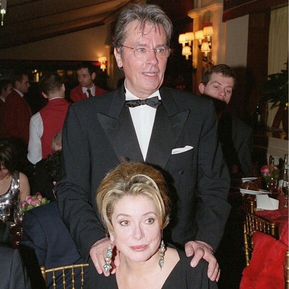 Alain Delon et Catherine Deneuve - Soirée au Fouquet's pour la 25ème cérémonie des César à Paris