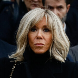 La première dame Brigitte Macron - Sorties des obsèques de Philippe Tesson en l'église Saint-Germain des-Prés à Paris le 10 février 2023. © Christophe Clovis / Bestimage