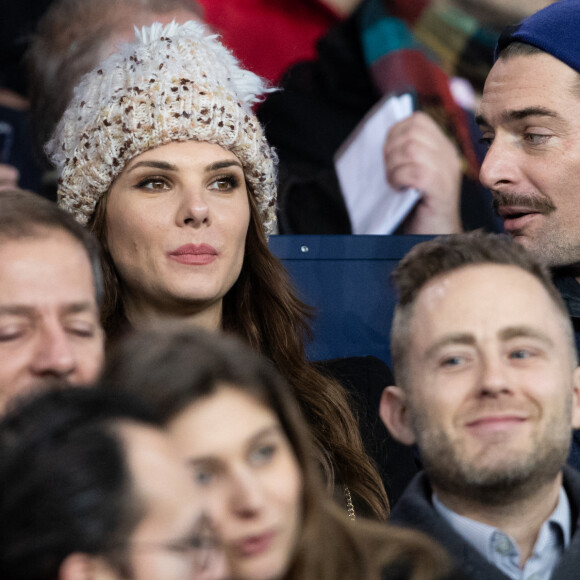 Camille Lacourt et sa compagne Alice Detollenaere (Miss Bourgogne 2010) dans les tribunes lors du match de championnat de Ligue 1 Conforama opposant le Paris Saint-Germain (PSG) aux Girondins de Bordeaux au Parc des Princes à Paris, France, le 23 février 2020. Le PSG a gagné 4-3. © Cyril Moreau/Bestimage 