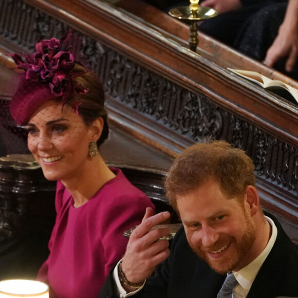Le prince William, duc de Cambridge, et Catherine (Kate) Middleton, duchesse de Cambridge, Le prince Harry, duc de Sussex, et Meghan Markle, duchesse de Sussex - Cérémonie de mariage de la princesse Eugenie d'York et Jack Brooksbank en la chapelle Saint-George au château de Windsor, Royaume Uni.