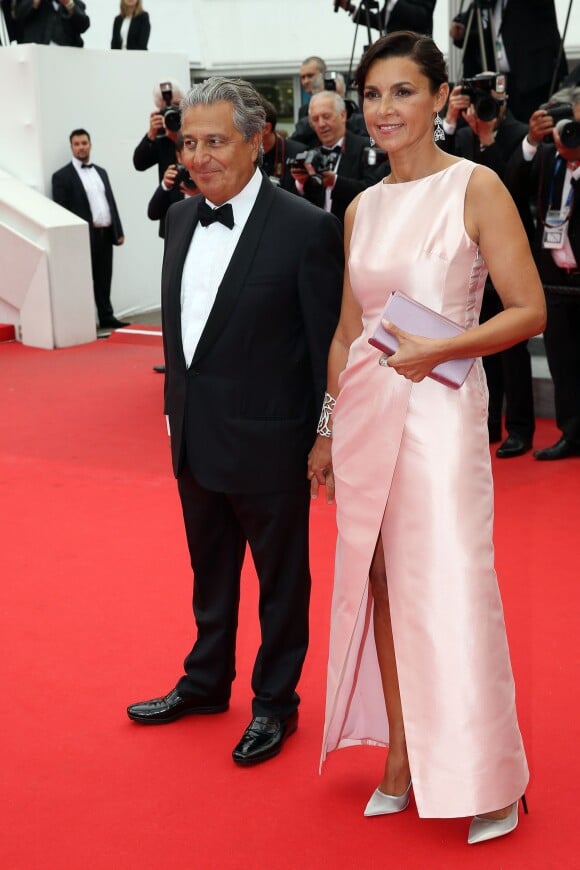 Christian Clavier et sa compagne Isabelle De Araujo (Bijoux APM Monaco) - Montée des marches du film "Jimmy's Hall" lors du 67e Festival du film de Cannes le 22 mai 2014.
