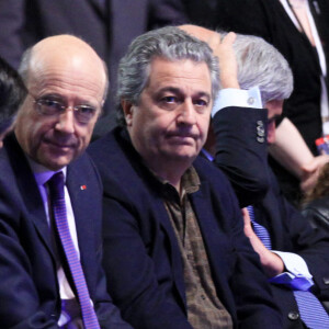 Alain Juppé et Christian Clavier le 11 mars 2012, au meeting de Nicolas Sarkozy à Villepinte.